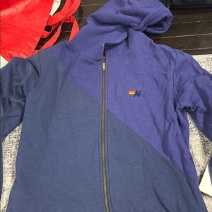 Woman’s half striped aviator nation zip up